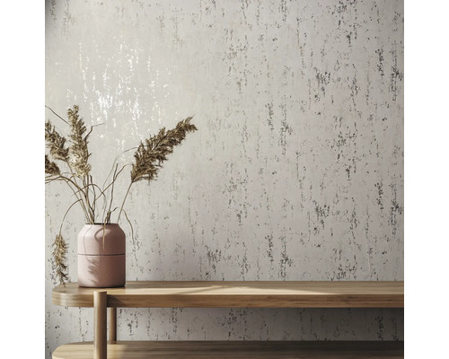 Mur avec papier peint texturé, table et vase avec de l''herbe sèche
