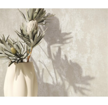 Dekorative Vase mit Pflanzen auf strukturiertem Hintergrund