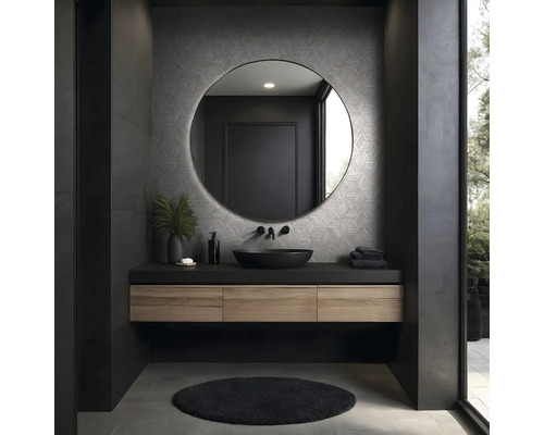 Salle de bains moderne avec miroir rond, lavabo et accents sombres