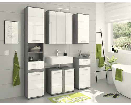 Badezimmer-Set mit Waschbecken, Spiegelschrank und Hochschränken in modernem Design.