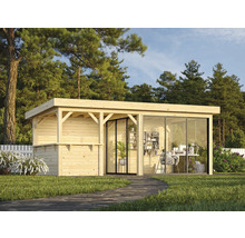 Abri de jardin avec véranda et façade en verre dans le jardin