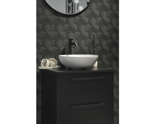 Salle de bains moderne avec meuble sous-lavabo noir, vasque à poser et carreaux muraux tridimensionnels