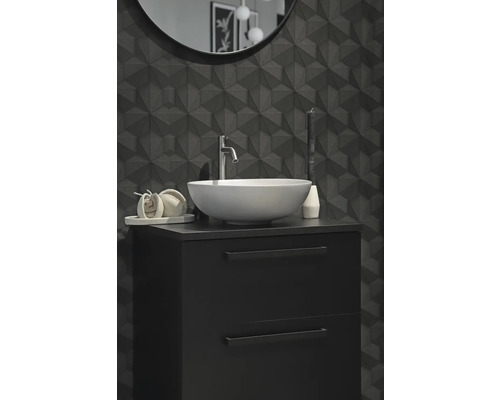 Salle de bains moderne avec lavabo, meuble sous-lavabo et carrelage géométrique