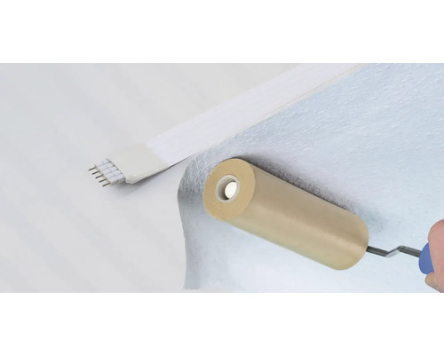 Rouleau à maroufler lors de la pose de papier peint