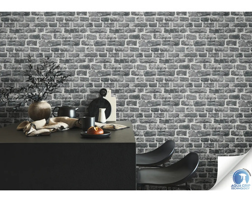 Gros plan d''un papier peint en briques grises dans une cuisine décorée avec la technologie Aqua Grip