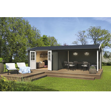 Abri de jardin avec terrasse et mobilier de jardin à l''extérieur.