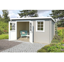 Abri de jardin avec double porte et fenêtre dans le jardin