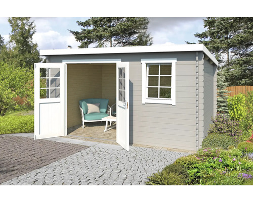 Abri de jardin avec double porte et fenêtre dans le jardin