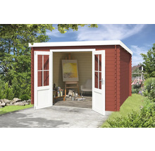 Abri de jardin avec portes doubles ouvertes, à l''intérieur chevalet et matériel de peinture