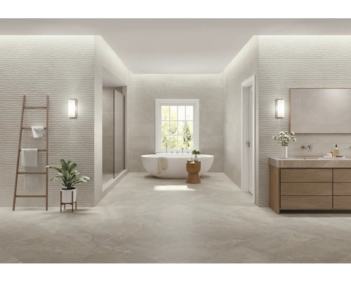 Salle de bain avec baignoire, douche, lavabo et échelle porte-serviettes pour une ambiance claire et spacieuse.