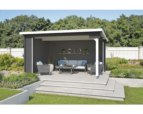 Gartenhaus mit Sitzgruppe auf einer Terrasse im Garten
