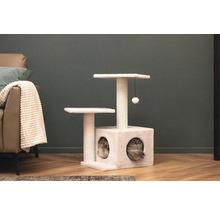 Arbre à chat avec surfaces de couchage et niche pour chat dans le salon