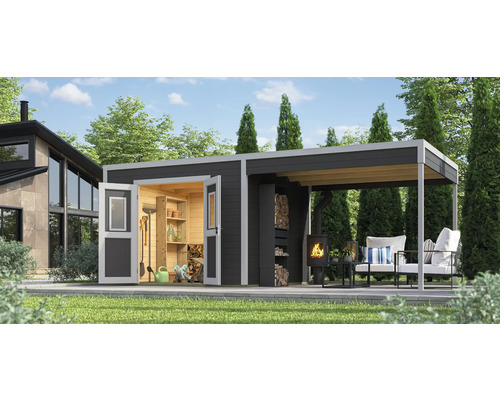 Abri de jardin avec outils, poêle à bois et coin salon extérieur