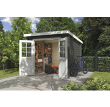 Abri de jardin en bois avec étagères, tondeuse à gazon et un vélo dans le jardin