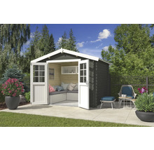 Abri de jardin avec portes doubles ouvertes, coin salon avec coussins et mobilier de jardin sur la terrasse