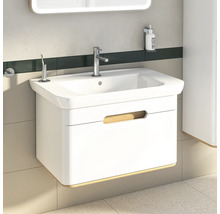 Meuble-lavabo blanc avec robinet et espace de rangement dans la salle de bain