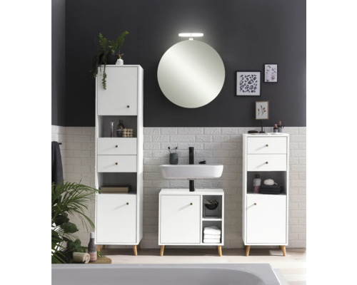 Salle de bains avec armoire haute, meuble bas, lavabo et miroir rond