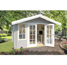 Abri de jardin avec fenêtres et portes vitrées dans le jardin