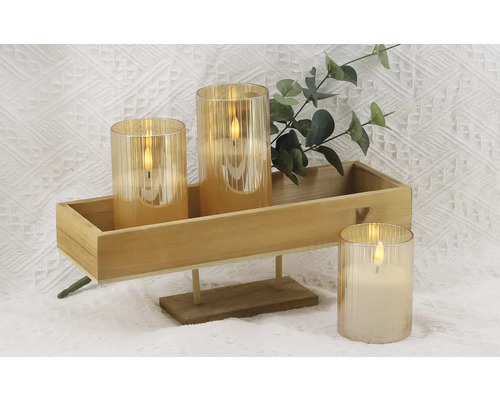 Bougies LED décoratives dans un plateau en bois