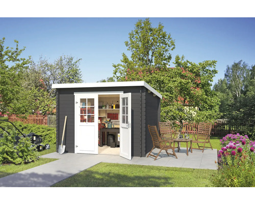 Abri de jardin Outdoor Life San Jose 295 x 268,7 cm gris carbone Scène de jardin avec abri de jardin, outils de jardinage, tondeuse à gazon et coin salon dans le jardin