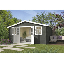 Abri de jardin avec double porte et fenêtre dans un jardin verdoyant