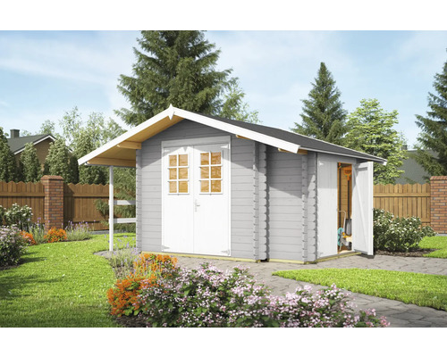 Abri de jardin en bois avec porte double et auvent dans le jardin