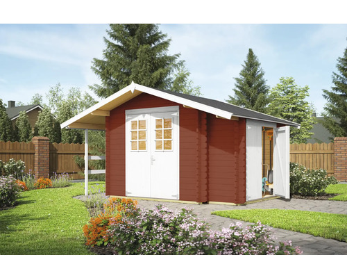 Abri de jardin rouge avec double porte et auvent dans le jardin