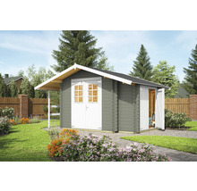 Abri de jardin en bois avec porte double et annexe dans le jardin