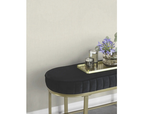 Banquette rembourrée avec structure métallique, table d''appoint avec décoration