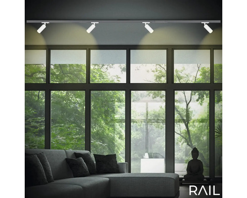 Salon avec système de rails et spots pour l''éclairage