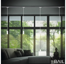 Salon avec système de rails et suspensions