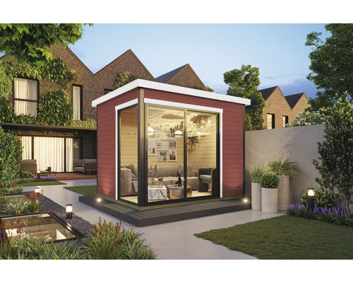 Abri de jardin moderne avec porte coulissante dans un jardin verdoyant