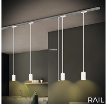 Innenraum mit Schienensystem und vier Pendelleuchten mit einer Länge von 1440 Millimeter.