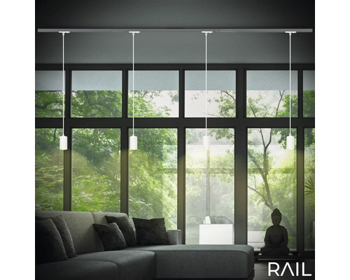 Wohnzimmer mit Schienensystem und Pendelleuchten