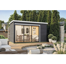 Abri de jardin moderne avec portes coulissantes, équipé d'une table, de chaises et d'un lit.