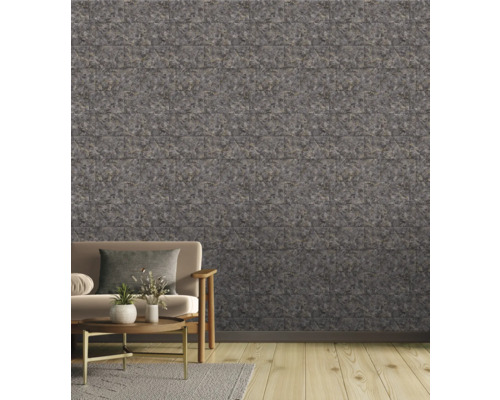 Salon avec mur en pierre grise et plancher en bois clair