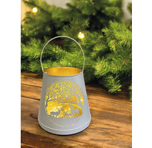 Lanterne décorative avec motif de cerf et arbre sur une table en bois