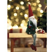 Nain de Noël décoratif avec étoile sur un banc