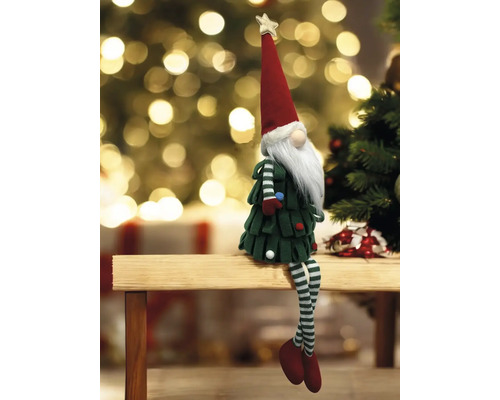 Dekorativer Weihnachtswichtel mit Stern auf einer Bank