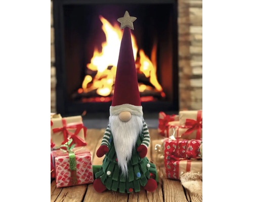 Weihnachtlicher Zwerg vor einem Kamin und Geschenken