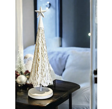 Arbre de Noël décoratif avec étoile sur une table