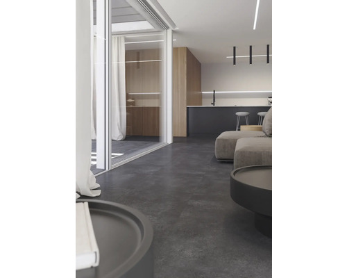 Salon avec canapé, table et porte coulissante en verre