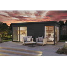 Maison de jardin moderne avec cuisine, chambre et terrasse avec coin salon