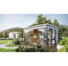 Abri de jardin moderne avec portes coulissantes et mobilier de bureau dans le jardin