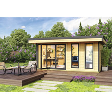 Maison de jardin moderne avec terrasse et installation de bureau dans le jardin