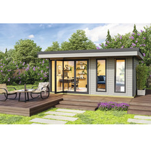 Maison de jardin moderne avec terrasse et mobilier de bureau dans un environnement verdoyant