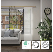 Salon avec canapé et store japonais transparent avec le label Standard 100 d''Oeko-Tex, symbole de transparence et label Designed in Germany.