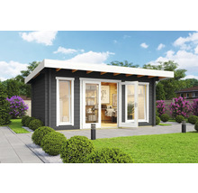 Abri de jardin en bois avec fenêtres et double porte sur une surface pavée