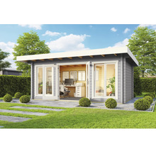 Abri de jardin moderne avec mobilier de bureau à l''extérieur sur une pelouse