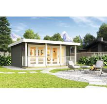 Jardin avec une maison de jardin moderne, terrasse, coin salon et foyer.